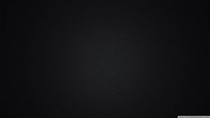 Dark Textured Background With Subtle Grain And Vignette Effect For Desktop HD wallpaper