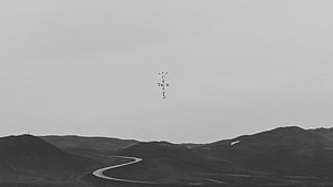 Travis Scott Cactus Jack Logo Over Black and White Desert Highway Landscape HD wallpaper