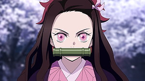 Nezuko Kamado from Demon Slayer with bamboo muzzle and intense pink eyes HD wallpaper