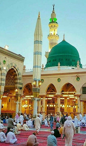 The Green Dome of Al-Masjid an-Nabawi Mosque in Medina with Minarets and Worshippers HD phone wallpaper