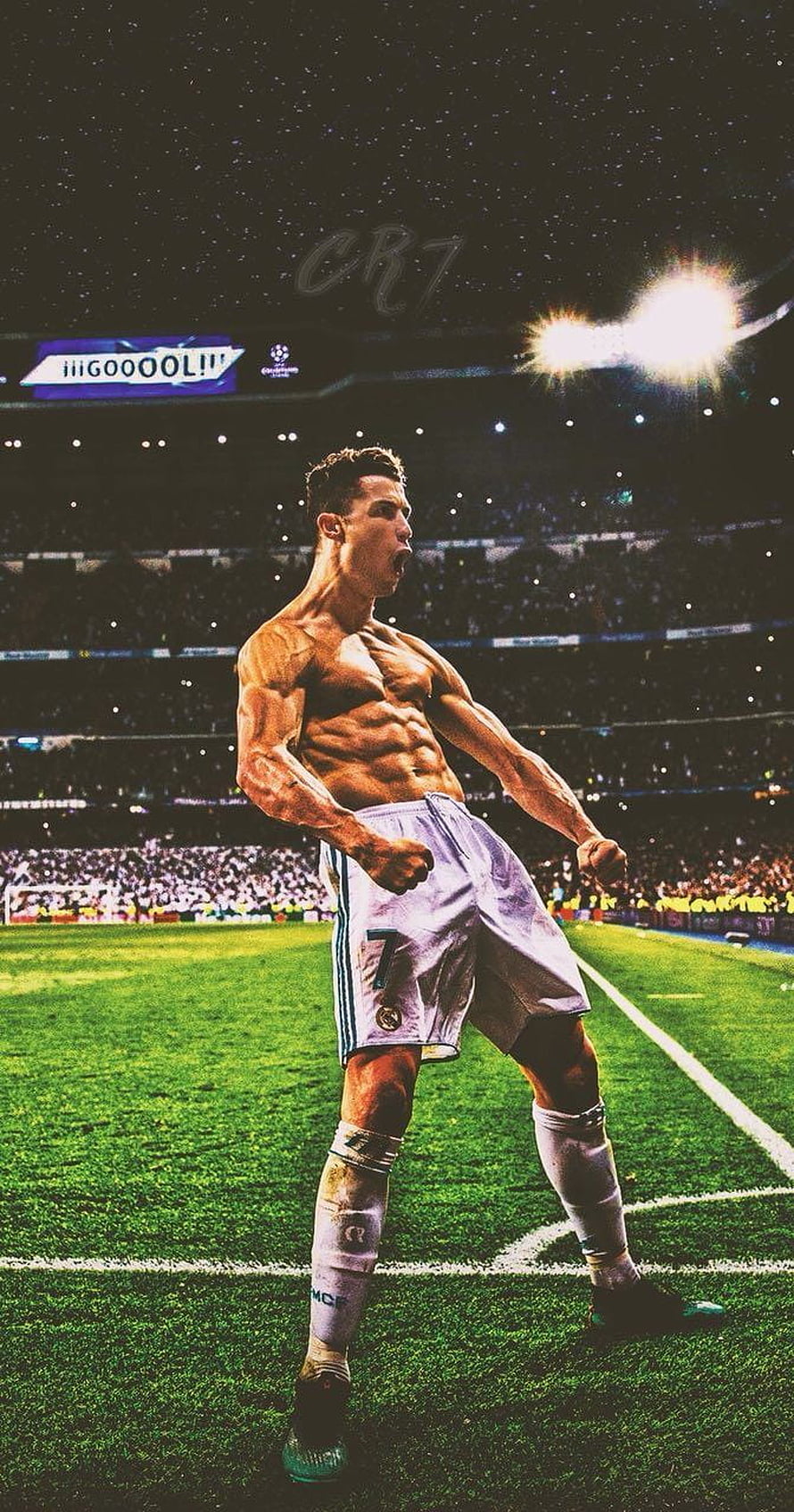 Cristiano Ronaldo shirtless goal celebration on the football pitch HD phone wallpaper