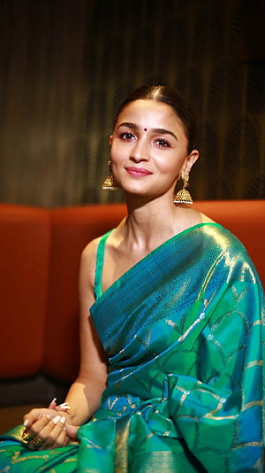 Alia Bhatt in a Green Silk Saree with Gold Zari Work and Traditional Jhumka Earrings HD phone wallpaper
