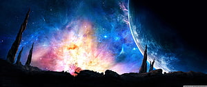 Vibrant Cosmic Nebula and Distant Planet Rising Over Jagged Alien Landscape HD wallpaper