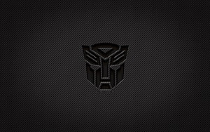 Transformers Decepticons Emblem on Dark Carbon Fiber Texture Background HD wallpaper