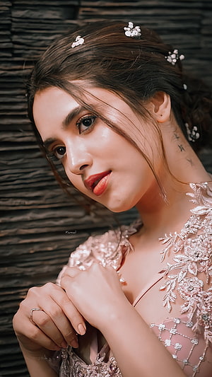 Portrait of a woman in a pink floral dress with hair accessories, Priyanka mohan, eye HD phone wallpaper