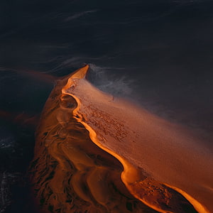 Aerial View of Dramatic Sand Dune Ridge at Golden Hour in the Desert HD phone wallpaper