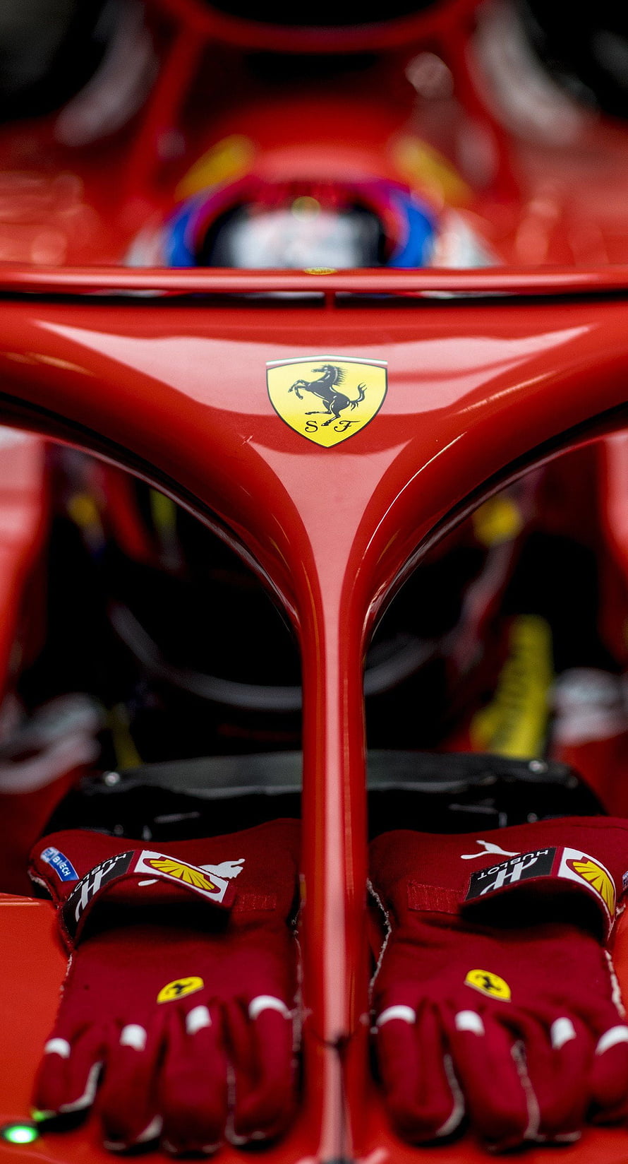 Close-Up of Ferrari F1 Car Nose with Prancing Horse Logo and Red Racing Gloves HD phone wallpaper