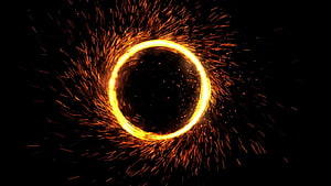 Glowing Orange Fire Ring With Sparks On Black Background HD wallpaper