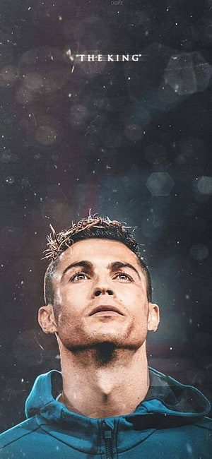 Cristiano Ronaldo Looking Up in Teal Hoodie Against Dark Bokeh Background HD phone wallpaper