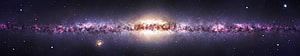 Stunning Panoramic View of the Milky Way Galaxy with Vibrant Purple and Gold Nebulae HD wallpaper