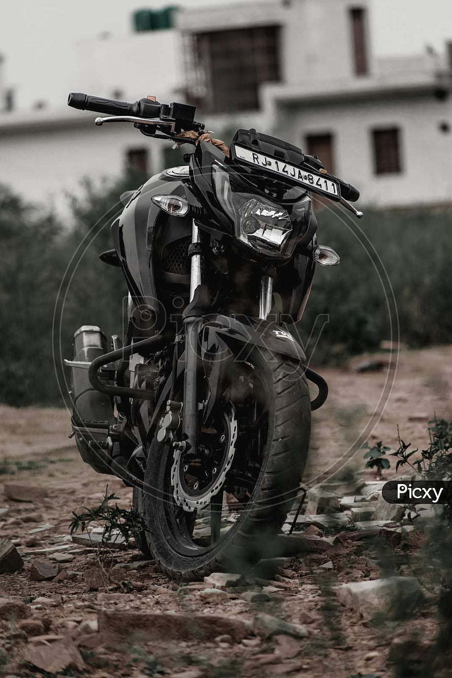 Black Apache RTR 160 4V Motorcycle Parked on a Gravel Path HD phone wallpaper