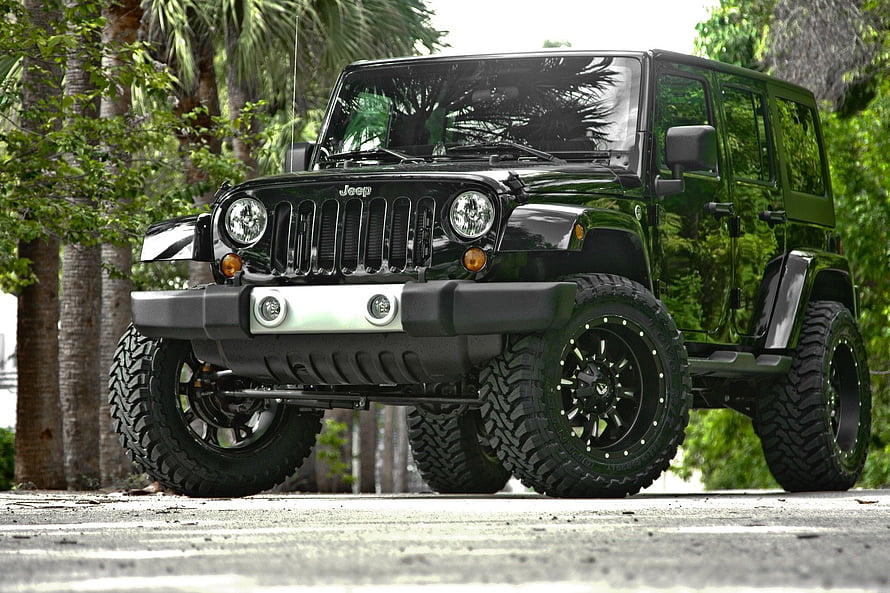 Black Modified Jeep Wrangler with Off-Road Tires and Custom Bumper HD wallpaper