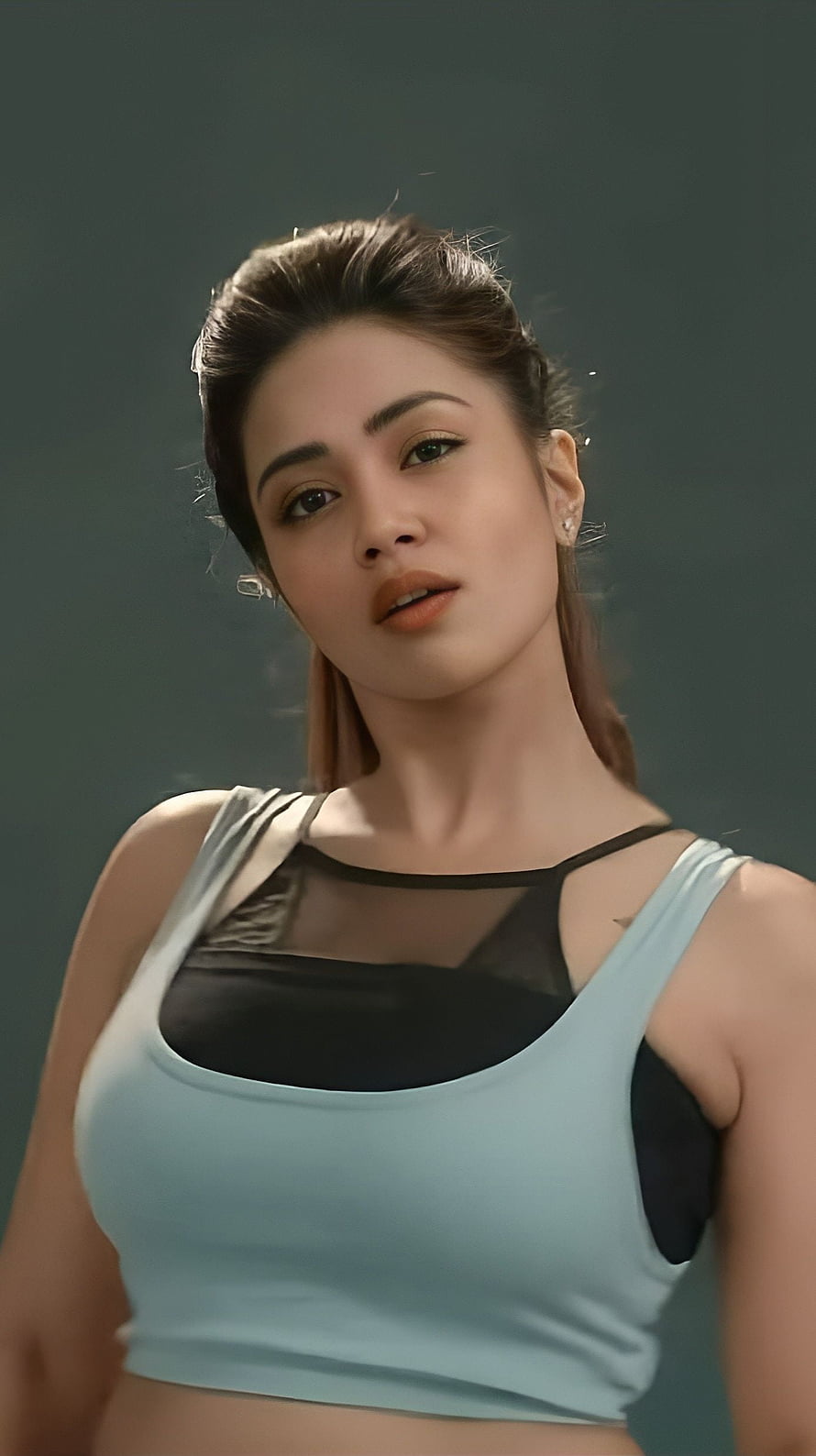 Nivetha Thomas Portrait in Light Blue Crop Top and Black Mesh Layer HD phone wallpaper