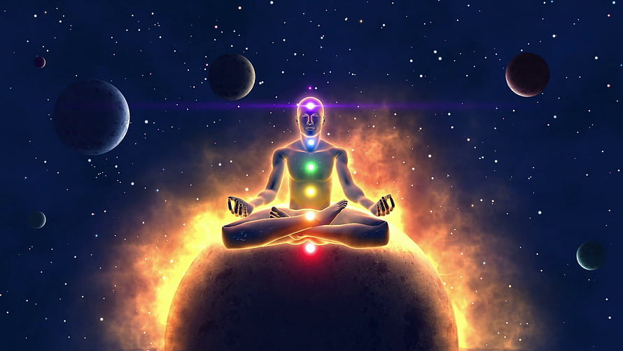 Meditating Figure with Glowing Chakras Seated on a Planet in a Starry Cosmic Space HD wallpaper