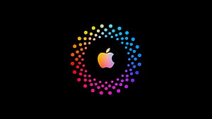 Apple Logo Encircled by Vibrant Rainbow Dot Pattern on Black Background HD wallpaper