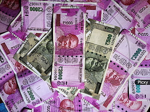 Scattered Indian Rupee Banknotes Featuring Mahatma Gandhi Portraits HD wallpaper