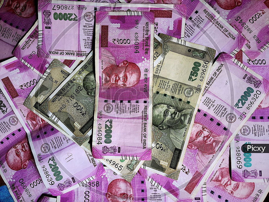 Scattered Indian Rupee Banknotes Featuring Mahatma Gandhi Portraits HD wallpaper