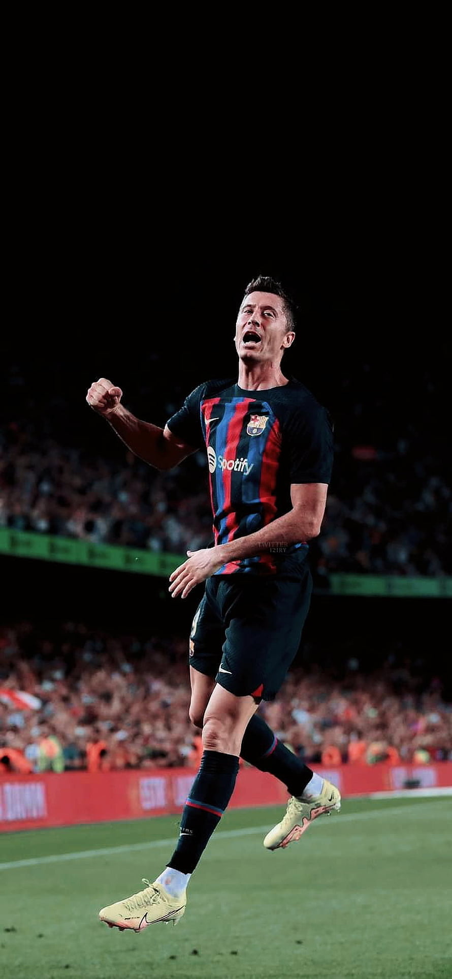 Robert Lewandowski Celebrating in Barcelona Home Kit on the Football Pitch HD phone wallpaper