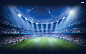 Illuminated Soccer Stadium at Night with Bright Floodlights and Crowd HD wallpaper