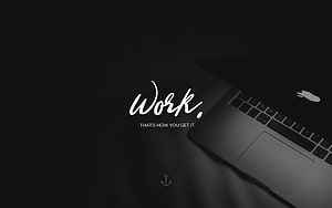 Minimalist Dark Laptop Workspace with Motivational Work Quote and Anchor Icon HD wallpaper