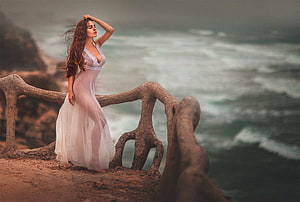 Elegant Woman in White Gown Standing by Ocean Cliffside, Ethereal Beauty, sea, digital, art, fantasy, graphy, girl, ethereal, woman HD wallpaper
