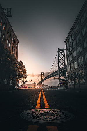 San Francisco Bay Bridge at Sunset with Urban Street View and Manhole Cover, Cities, Usa, Building, Road, Markup, Bridge, United States, San Francisco HD phone wallpaper