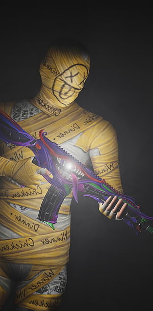 PUBG Mummy Skin Character Holding Purple Weapon in Dark Setting HD phone wallpaper