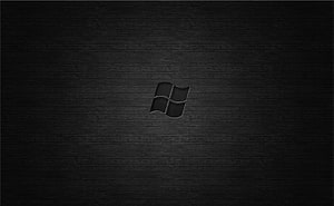Dark Windows Logo on Textured Black Surface Minimalist Desktop Background HD wallpaper