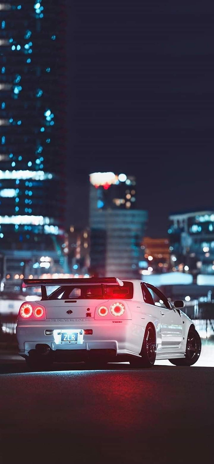 White Nissan Skyline GT-R R34 Night Cityscape Wallpaper HD phone wallpaper