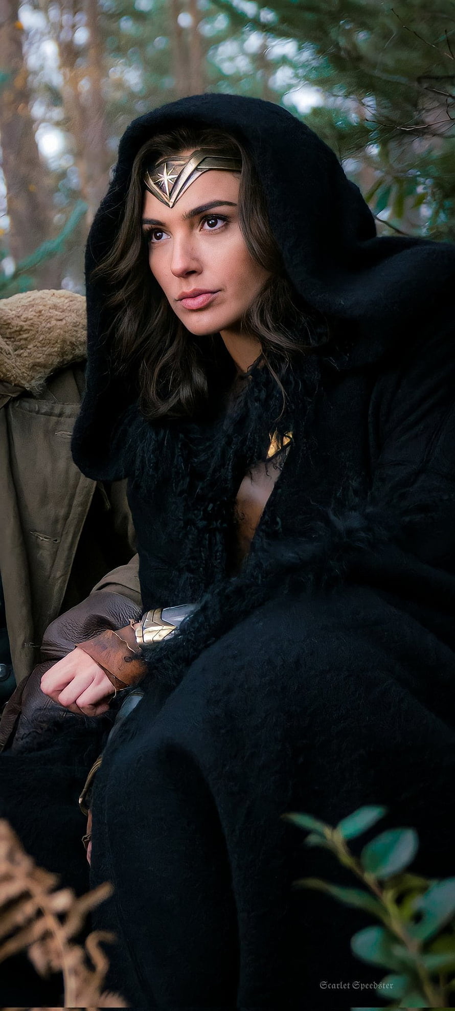 Gal Gadot as Wonder Woman in a black hooded cloak with golden tiara in a forest setting, Wonder Woman, face, gal Gadot HD phone wallpaper