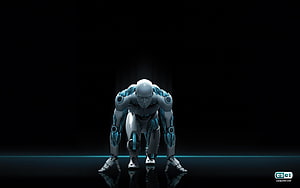 Futuristic Cybernetic Android in Crouching Pose with Blue Neon Accents HD wallpaper