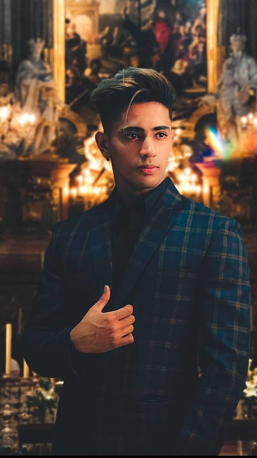 Danish Zehen in a blue plaid suit standing in a candlelit ornate hall HD phone wallpaper
