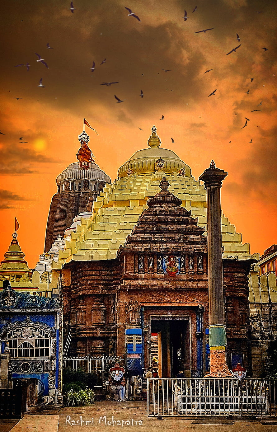 Puri Jagannath Temple at Sunset with Golden Sky and Flying Birds HD phone wallpaper