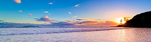 Serene Sunset Over Ocean Waves With Silhouetted Coastal Hills And Golden Sky HD wallpaper
