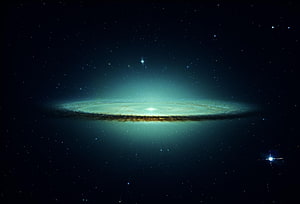 Spiral Galaxy with Dust Lanes and Glowing Core in Deep Space HD wallpaper