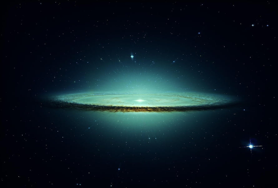Spiral Galaxy with Dust Lanes and Glowing Core in Deep Space HD wallpaper