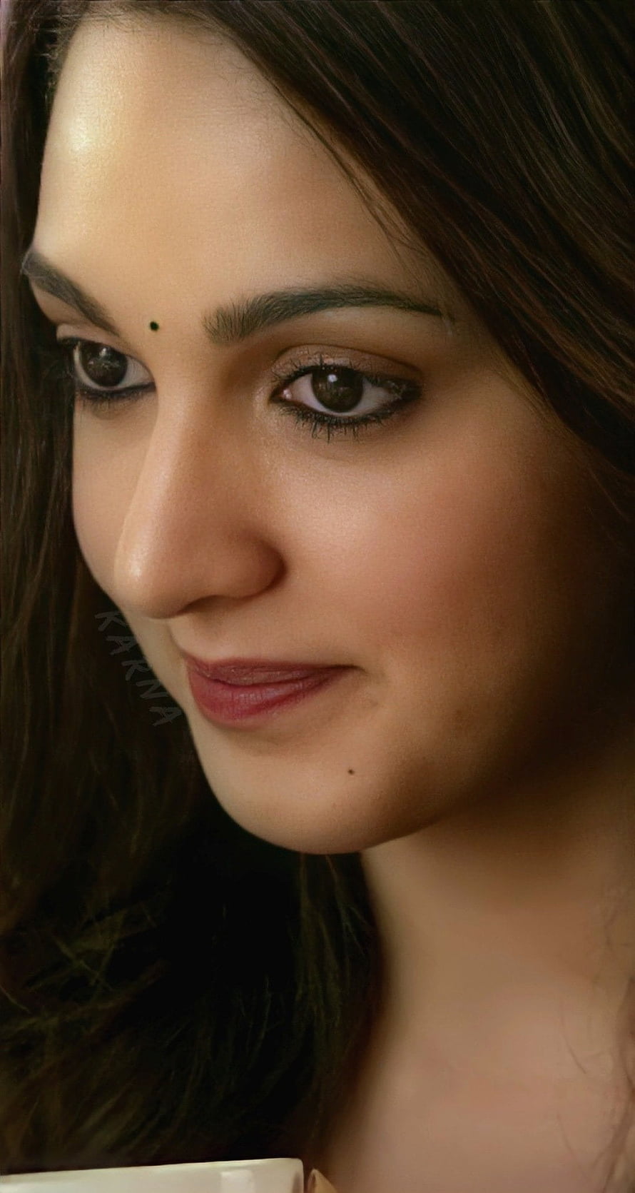 Kiara Advani Close-Up Portrait with Soft Warm Lighting and Natural Makeup HD phone wallpaper