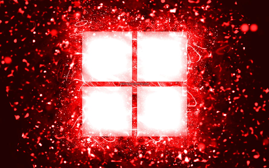 Glowing Red Microsoft Windows Logo Set Against a Fiery Particle Explosion Background HD wallpaper