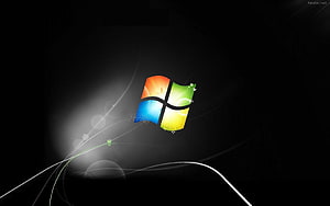 Windows 7 Logo on Dark Background with Abstract Light Streaks and Glowing Effects HD wallpaper