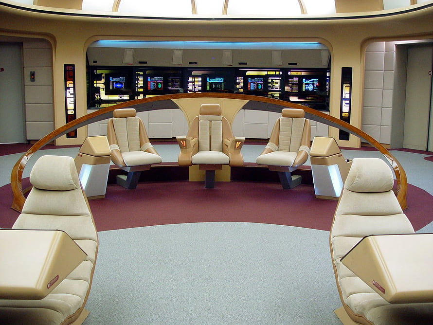 Star Trek Voyager Bridge Set Interior with Captain's Chair and Control Consoles HD wallpaper