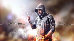 Ajith Kumar in a grey hoodie holding a lit cigarette against a smoky background HD wallpaper