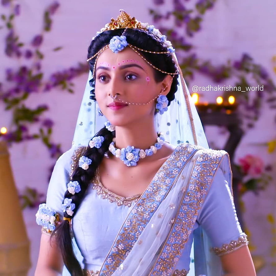 Radha Krishna World Actress in Blue Saree with Floral Jewelry and Crown HD phone wallpaper