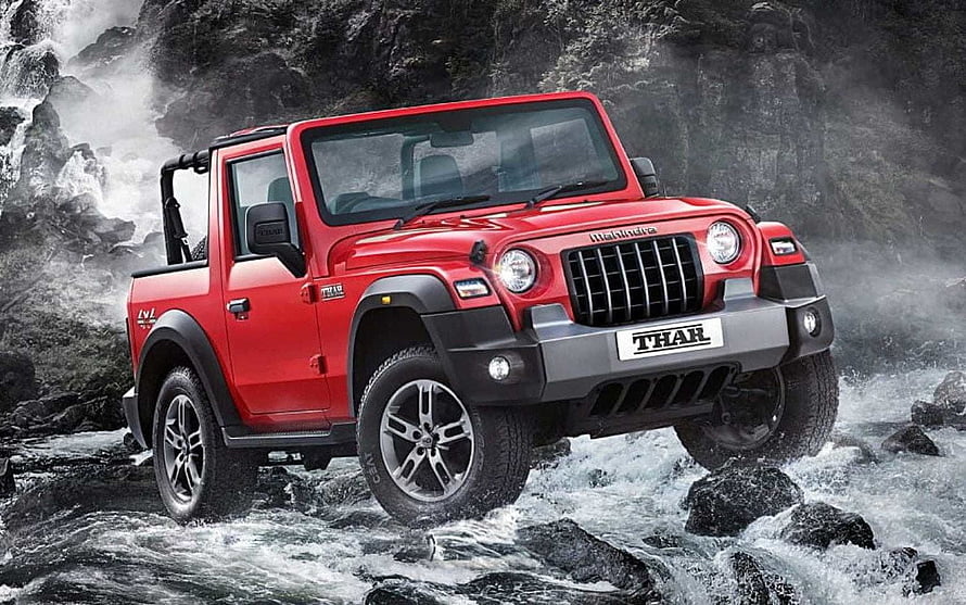 Red Mahindra Thar Pickup Truck Driving Through Rocky River Stream HD wallpaper