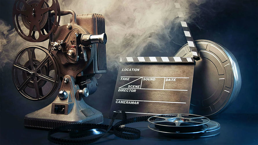 Vintage Film Projector and Clapperboard with Dramatic Smoke Effect HD wallpaper