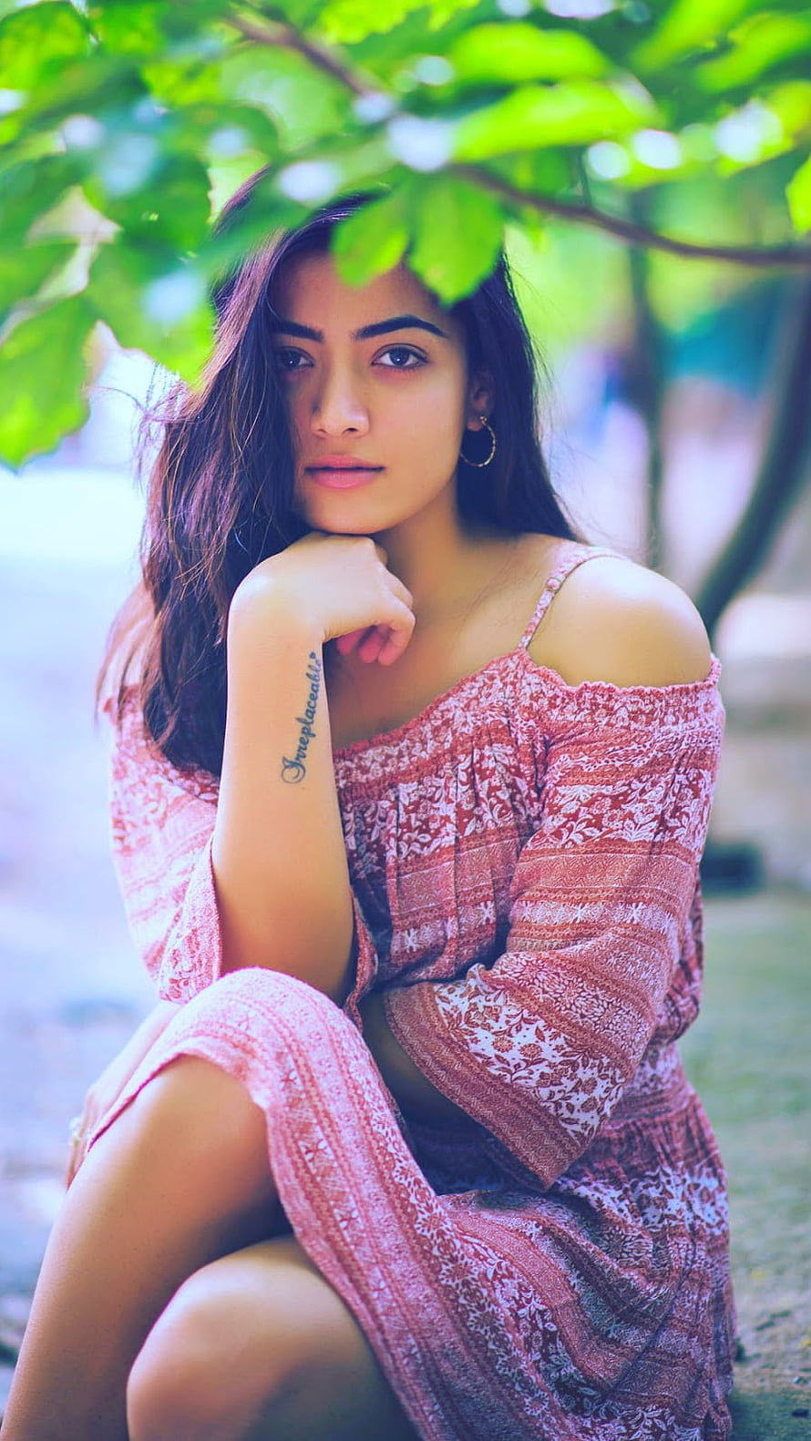 Woman in Pink Patterned Dress Sitting Under Green Leaves, Rashmika Mandanna, South, Actress HD phone wallpaper