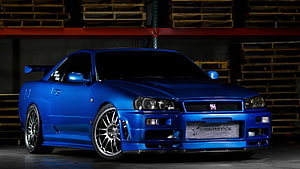 Nissan Skyline R34 GTR in Blue with Custom Widebody and Multi-Spoke Wheels HD wallpaper