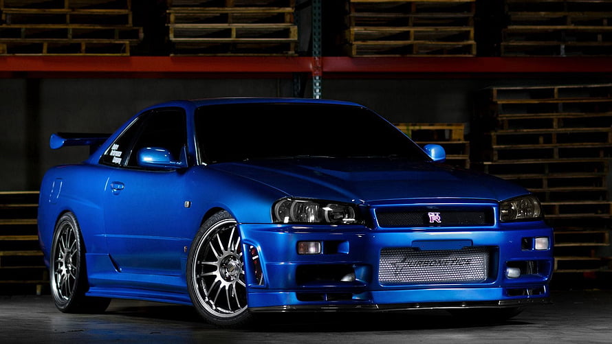 Nissan Skyline R34 GTR in Blue with Custom Widebody and Multi-Spoke Wheels HD wallpaper