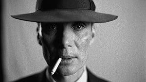 Cillian Murphy in Oppenheimer Black and White Portrait with Hat and Cigarette HD wallpaper