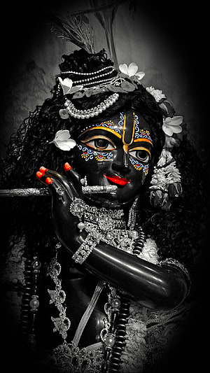 Black Krishna Idol Playing Flute With Red Lips And Peacock Feather Crown HD phone wallpaper