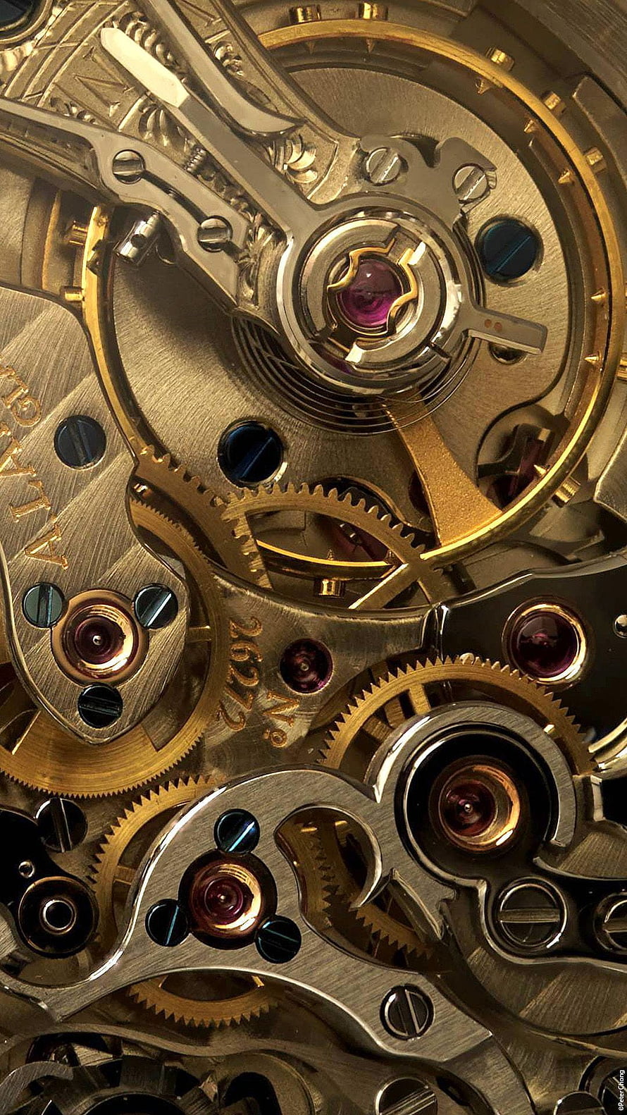 Intricate Mechanical Watch Movement with Brass Gears and Jeweled Bearings HD phone wallpaper